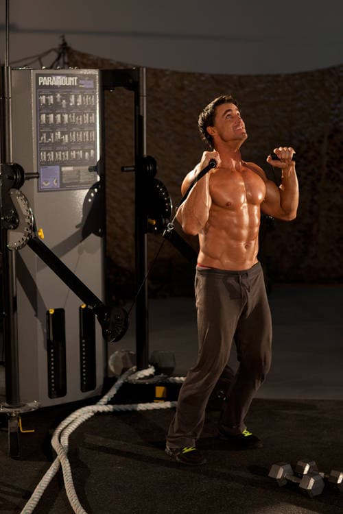 Alternating Cable Shoulder Press, position 1 of 2
