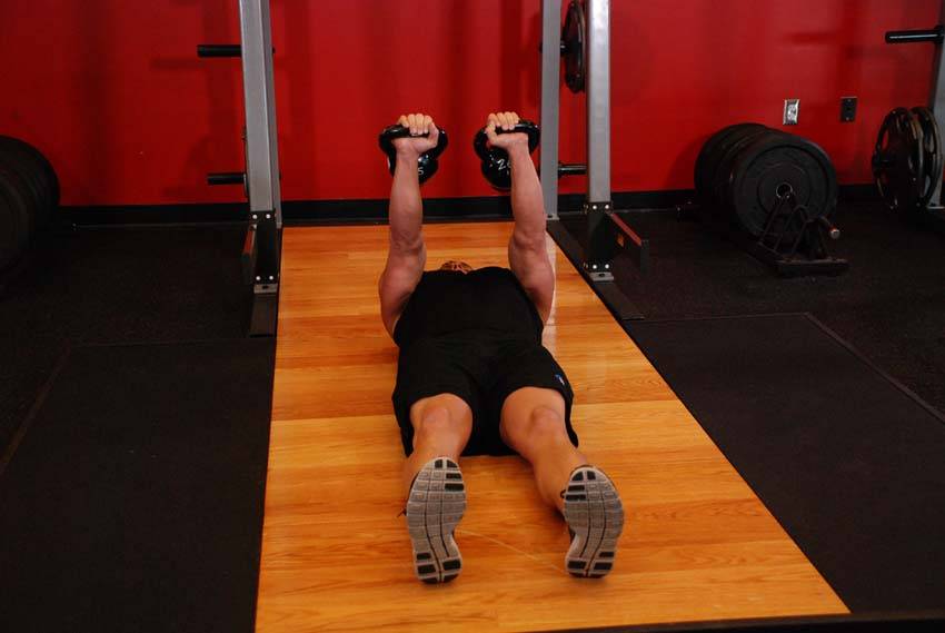 Alternating Floor Press, position 1 of 2