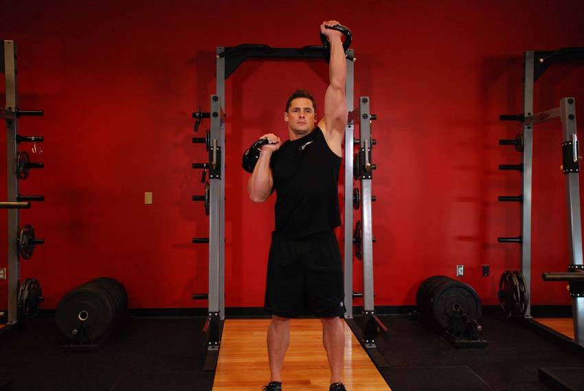 Alternating Kettlebell Press, position 2 of 2