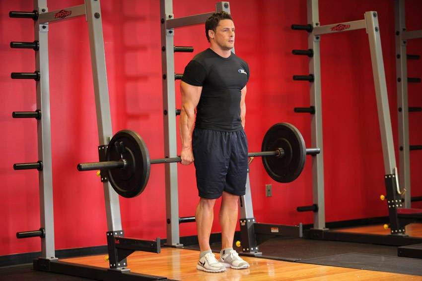 Barbell Shrug Behind The Back, position 1 of 2