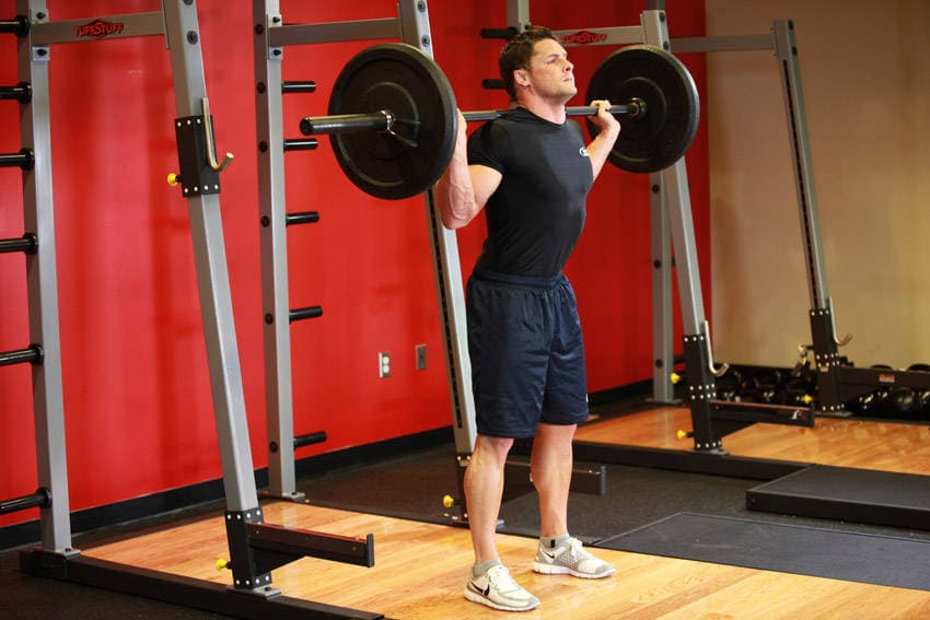 Barbell Squat, position 1 of 2