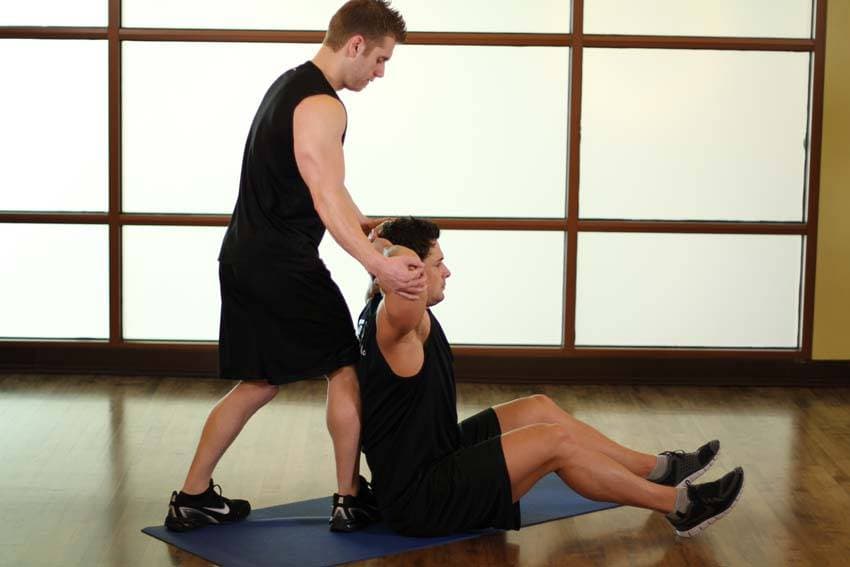Behind Head Chest Stretch, position 1 of 2