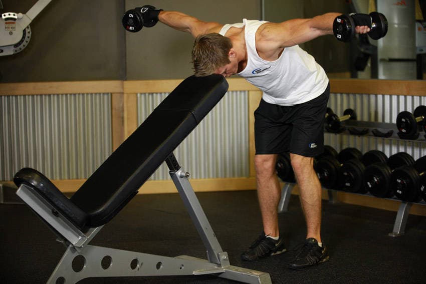 Bent Over Dumbbell Rear Delt Raise With Head On Bench, position 2 of 2