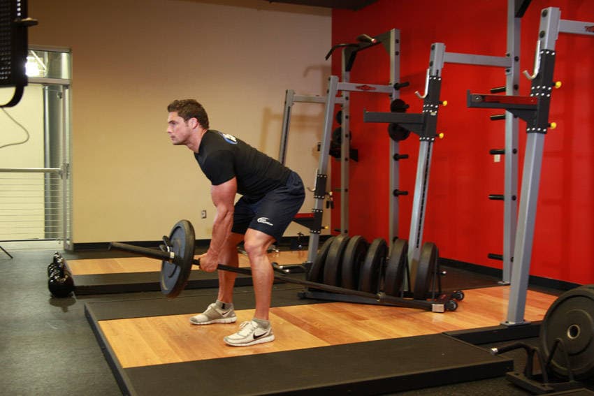 Bent Over One-Arm Long Bar Row, position 1 of 2