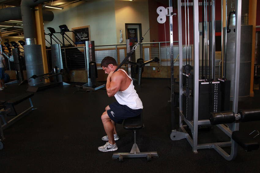 Cable Seated Crunch, position 1 of 2