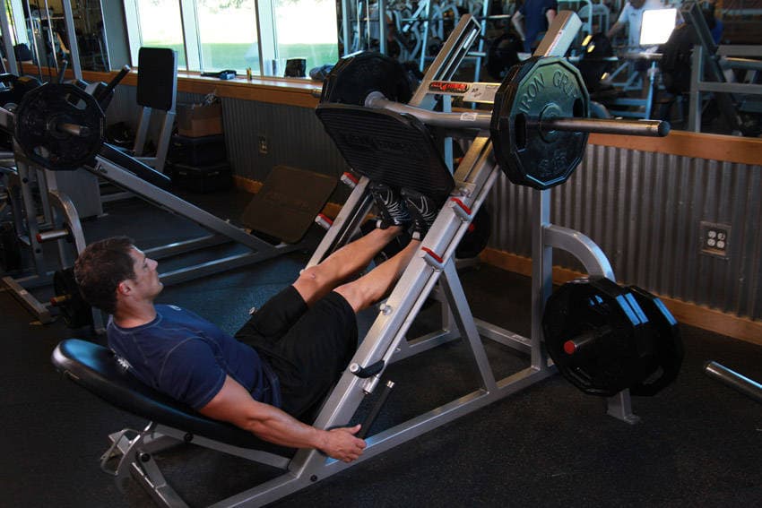 Calf Press On The Leg Press Machine, position 1 of 2