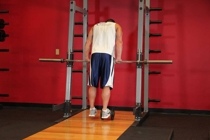 Calf Raise On A Dumbbell, position 1 of 2