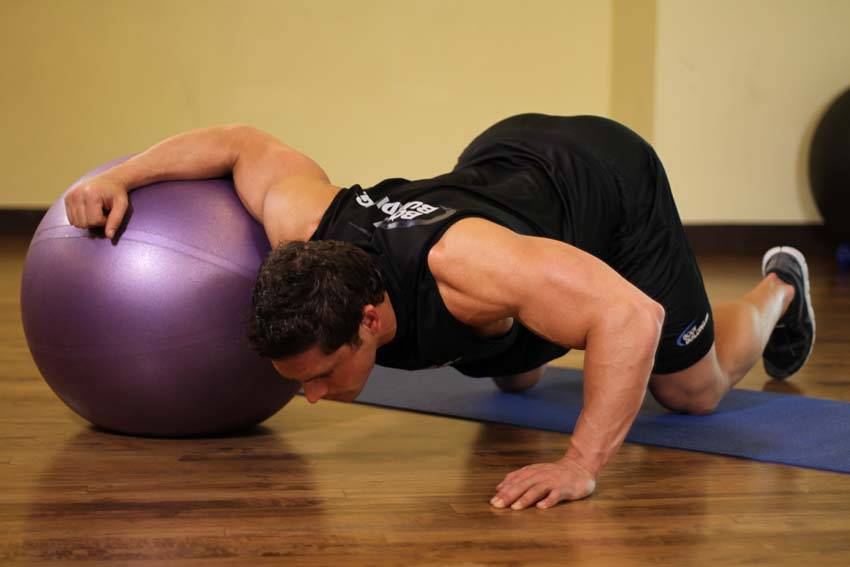 Chest Stretch on Stability Ball, position 1 of 2