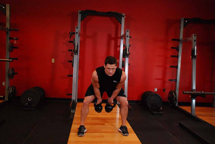 Double Kettlebell Snatch, position 2 of 2