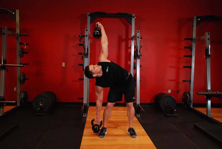 Double Kettlebell Windmill, position 2 of 2