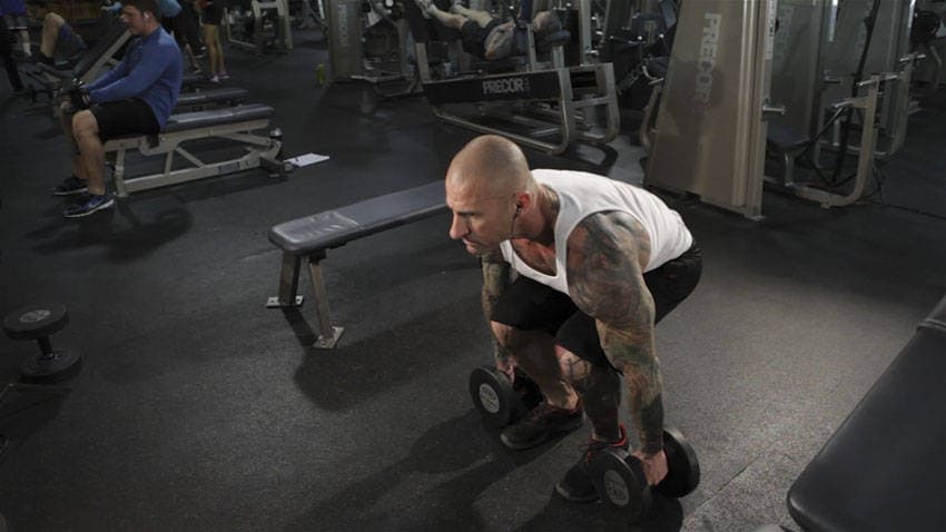 Dumbbell Clean, position 1 of 2
