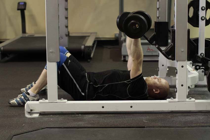 Dumbbell Floor Press, position 1 of 2