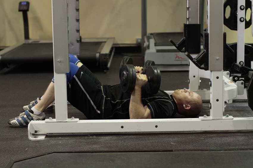 Dumbbell Floor Press, position 2 of 2