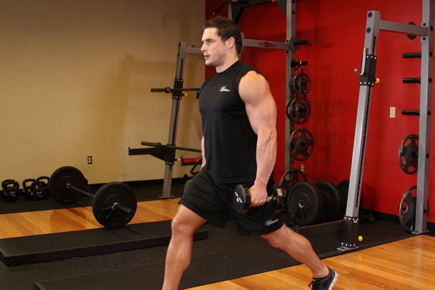 Dumbbell Lunges, position 1 of 2