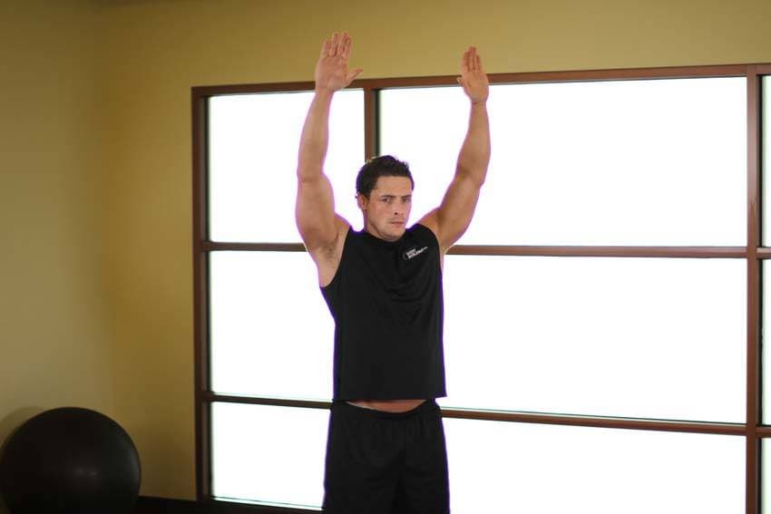 Dynamic Back Stretch, position 2 of 2