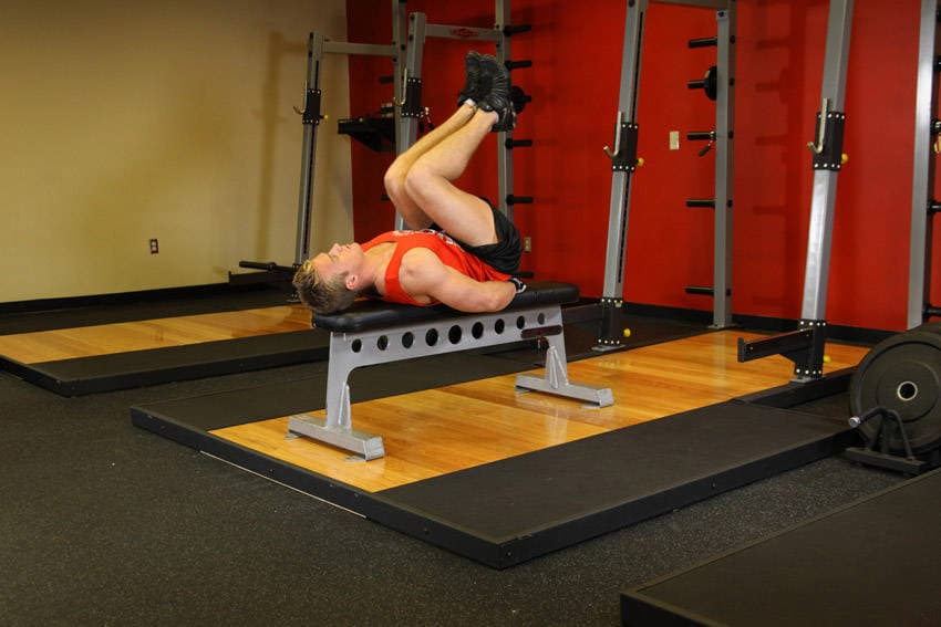Flat Bench Leg Pull-In, position 1 of 2