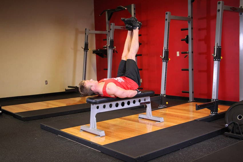 Flat Bench Lying Leg Raise, position 2 of 2