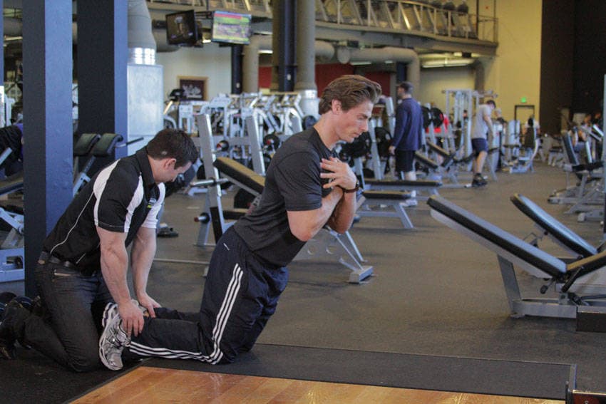 Floor Glute-Ham Raise, position 2 of 2