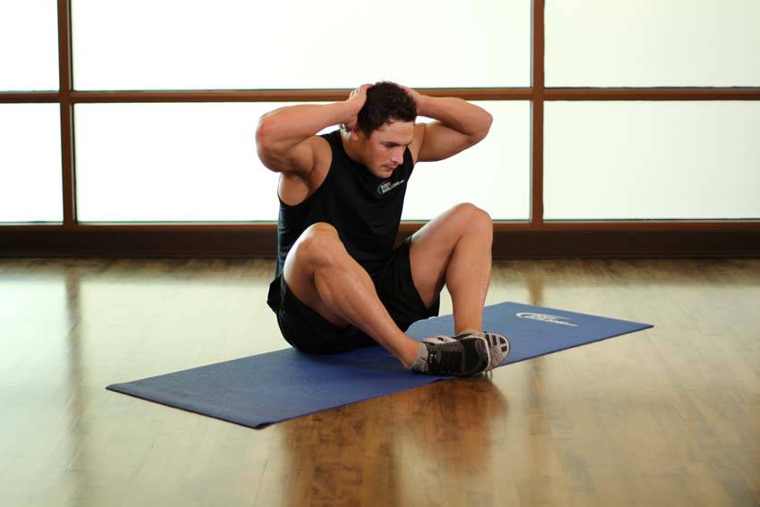 Groin and Back Stretch, position 1 of 2