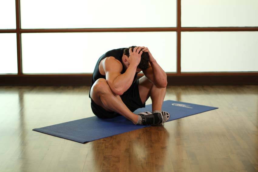 Groin and Back Stretch, position 2 of 2