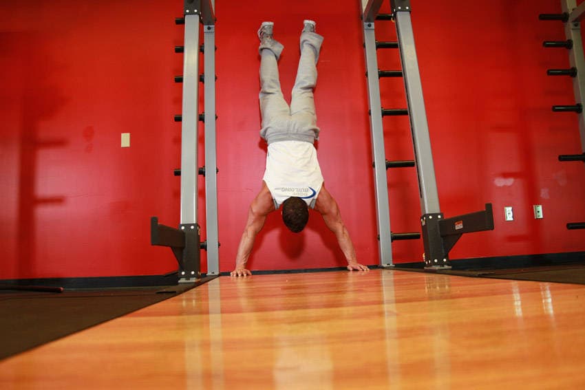 Handstand Push-Ups, position 1 of 2