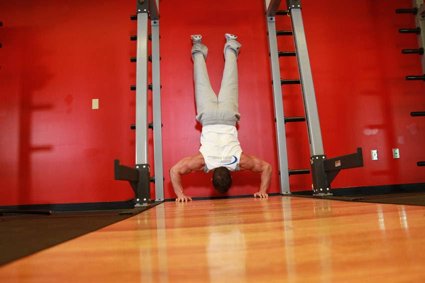 Handstand Push-Ups, position 2 of 2