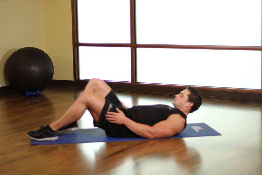 Hug Knees To Chest, position 1 of 2