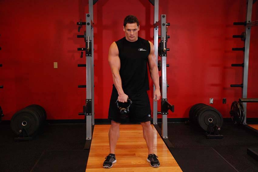 Kettlebell Hang Clean, position 1 of 2