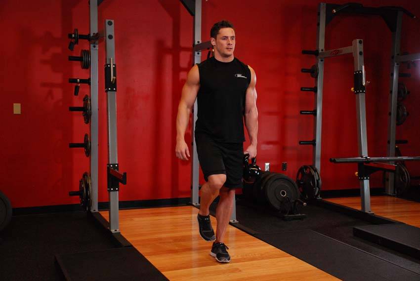 Kettlebell One-Legged Deadlift, position 1 of 2