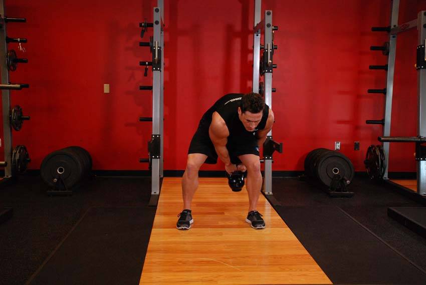 Kettlebell Pass Between The Legs, position 2 of 2