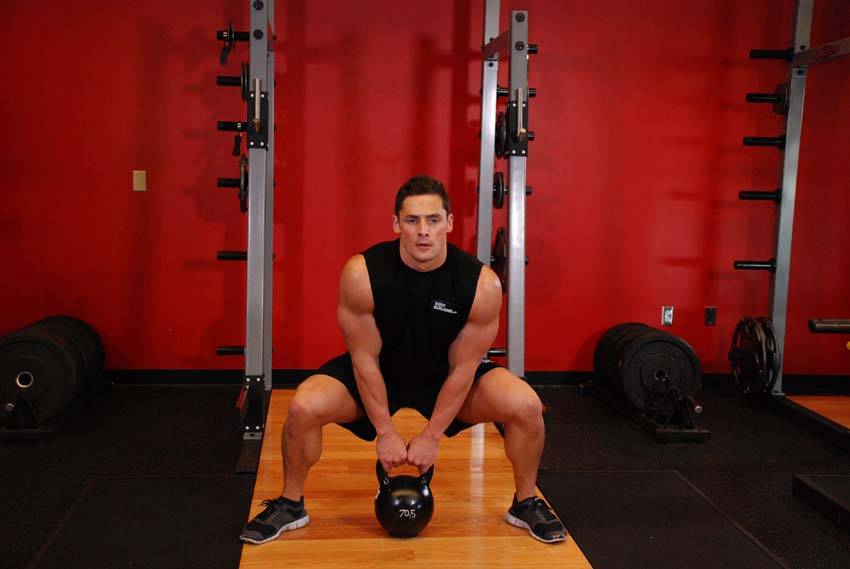 Kettlebell Sumo High Pull, position 1 of 2