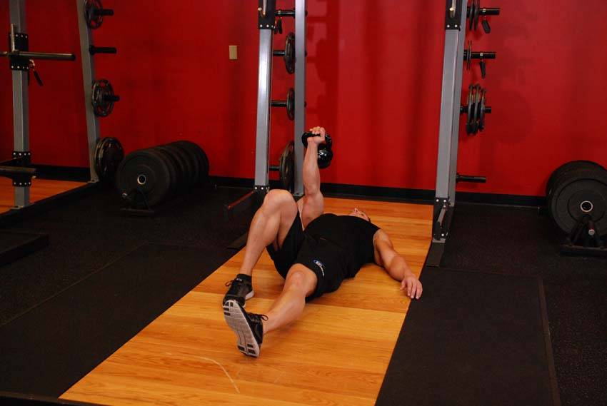 Kettlebell Turkish Get-Up (Lunge style), position 1 of 2
