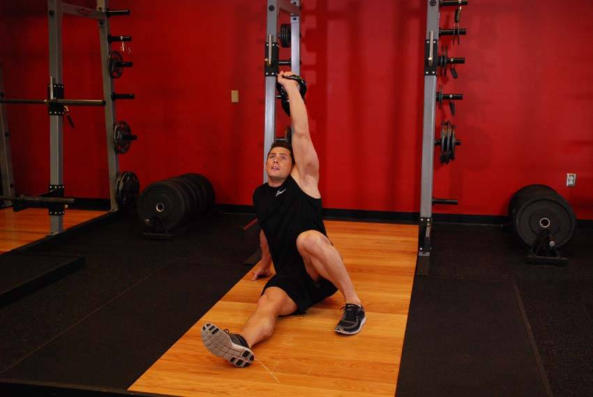 Kettlebell Turkish Get-Up (Squat style), position 2 of 2