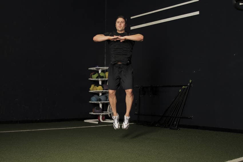 Knee Tuck Jump, position 2 of 2