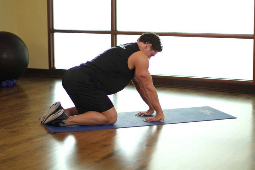 Kneeling Forearm Stretch, position 2 of 2