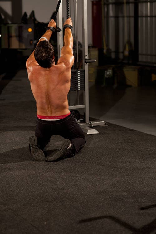 Kneeling High Pulley Row, position 1 of 2