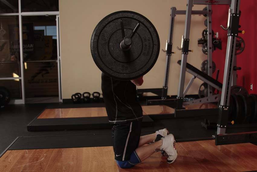 Kneeling Jump Squat, position 1 of 2