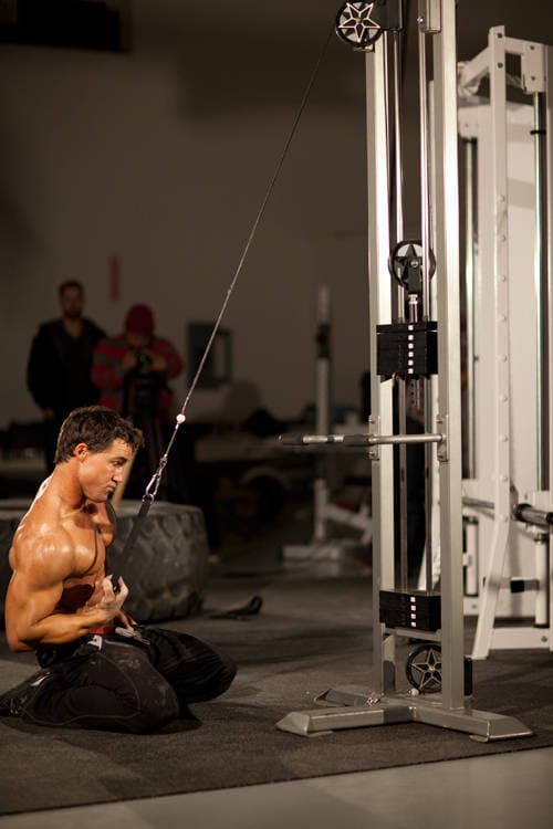 Kneeling Single-Arm High Pulley Row, position 2 of 2