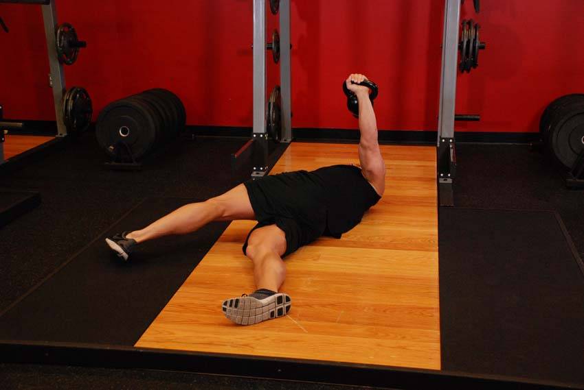 Leg-Over Floor Press, position 2 of 2