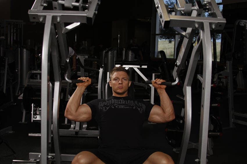 Leverage Shoulder Press, position 1 of 2
