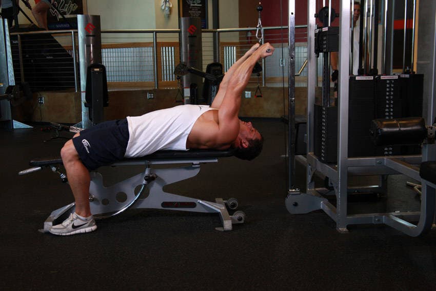 Lying Close-Grip Bar Curl On High Pulley, position 1 of 2