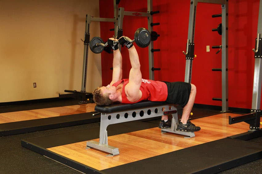 Lying Close-Grip Barbell Triceps Press To Chin, position 1 of 2