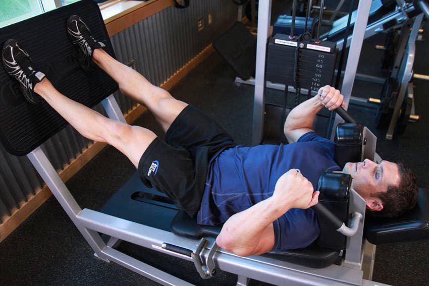 Lying Machine Squat, position 2 of 2
