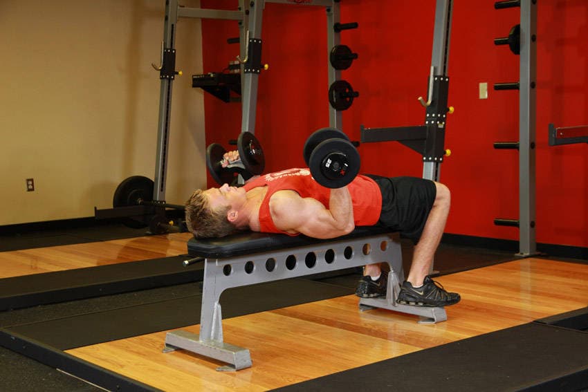 Lying Supine Dumbbell Curl, position 1 of 2