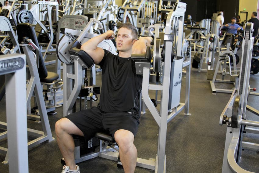 Machine Bicep Curl, position 2 of 2