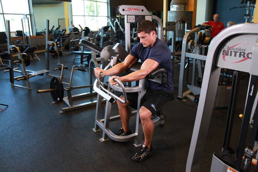 Machine Preacher Curls, position 1 of 2
