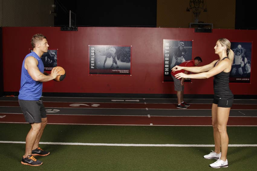 Medicine Ball Chest Pass, position 1 of 2