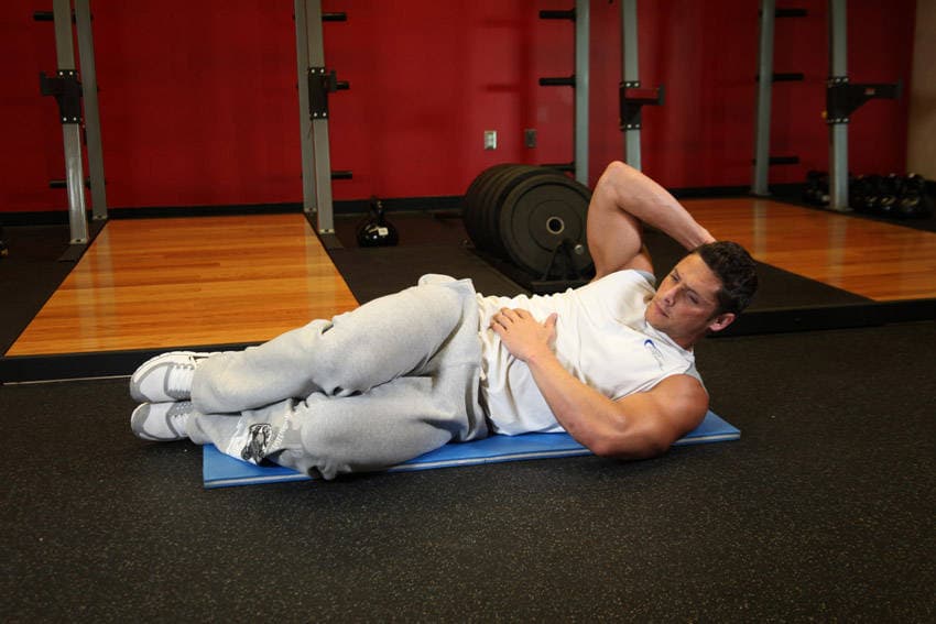 Oblique Crunches - On The Floor, position 1 of 2