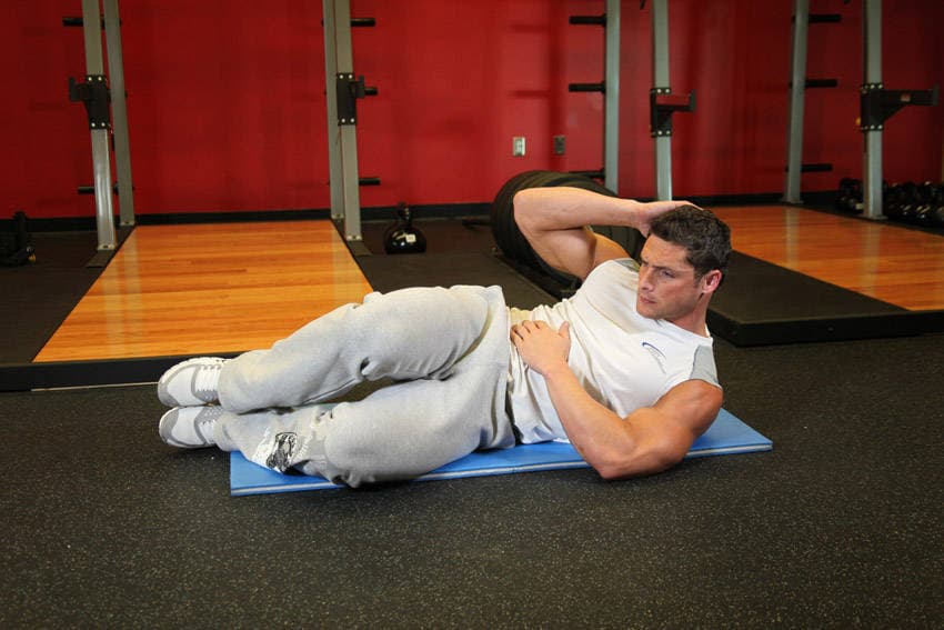 Oblique Crunches - On The Floor, position 2 of 2