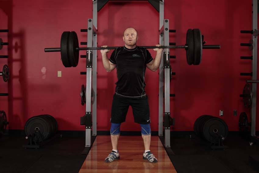Olympic Squat, position 1 of 2